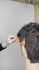 Vidéo montrant une coiffeuse utilisant une tondeuse de coupe N900 FEEL JAPAN STEALTH sur une tête malléable 